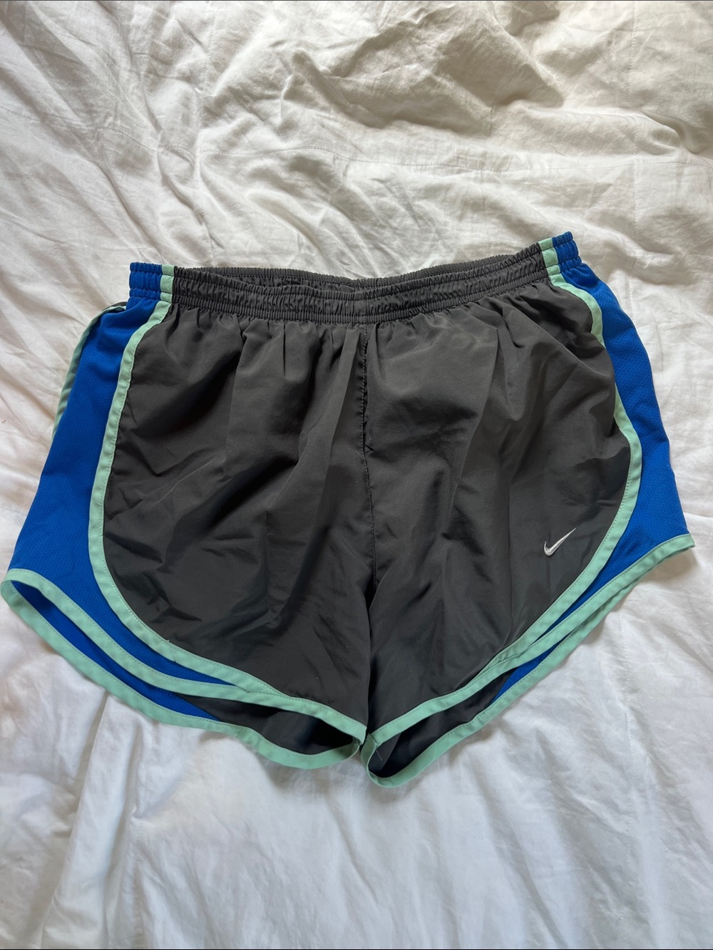 Nike Women’s Black Athletic Shorts with Blue Panels & Mint Trim